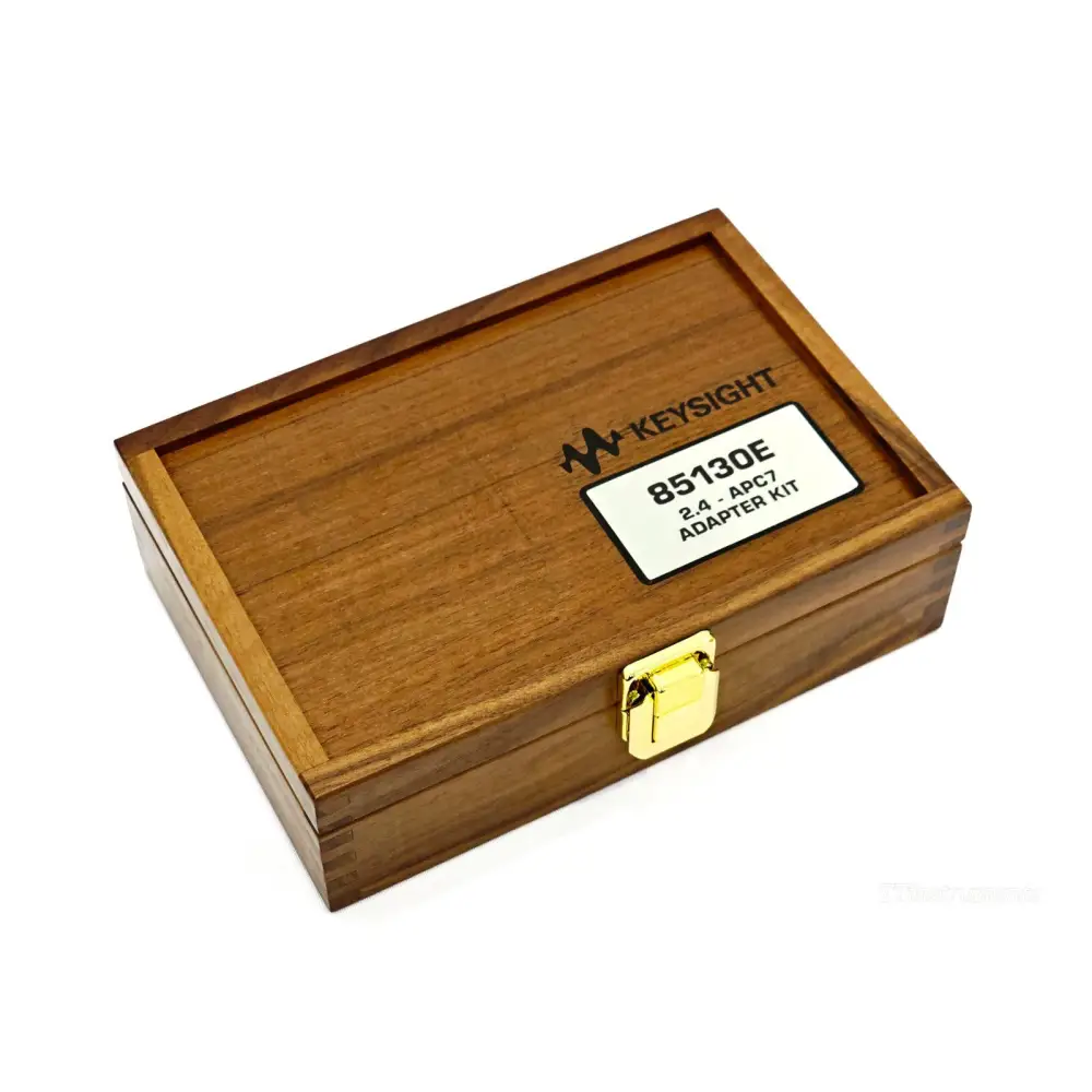 Keysight 85130E adapter kit closed wooden presentation case with Keysight label and gold clasp