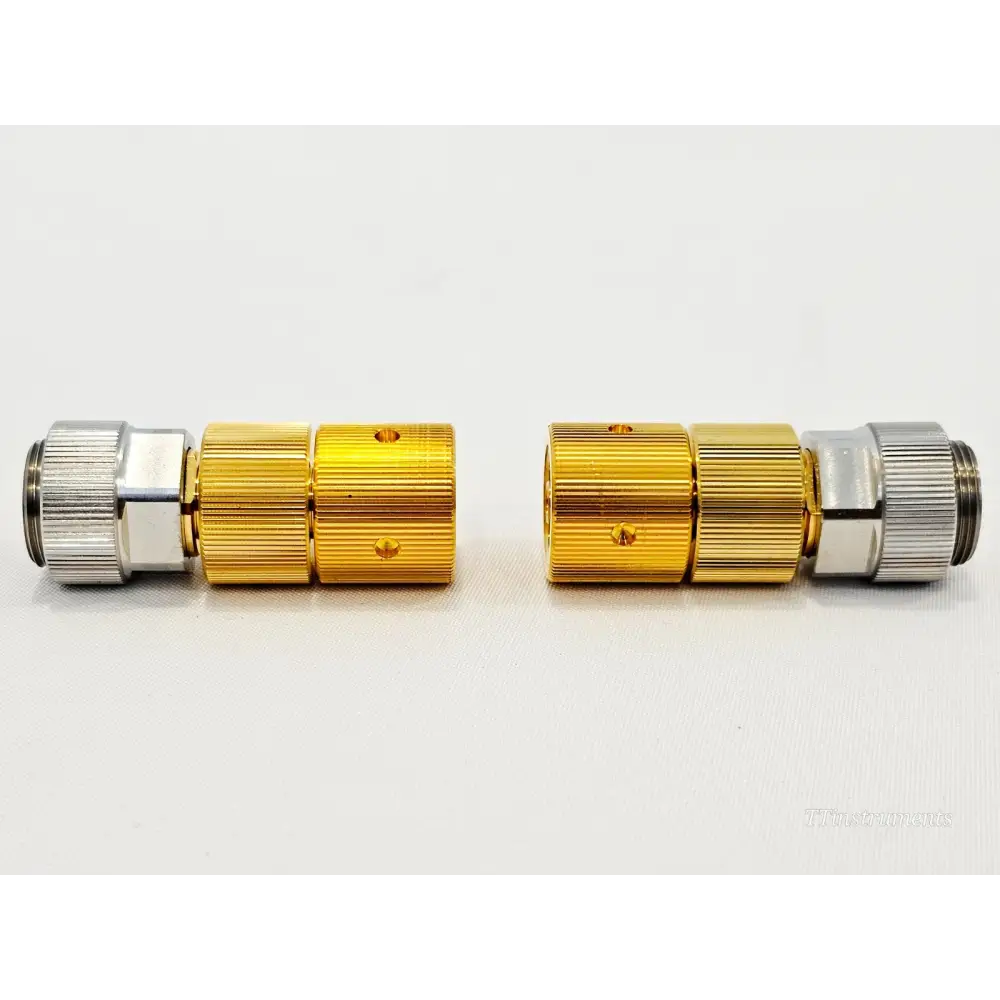 Keysight 85130-60014 side profile of both 2.4mm to APC-7 adapters showing gold and silver knurled body detail
