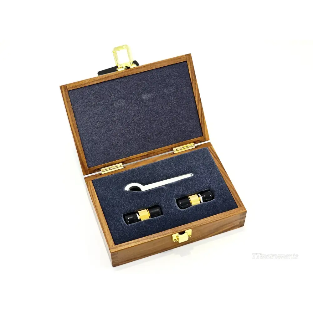 Keysight 85130E 2.4mm to APC-7 adapter kit open wooden case showing two adapters and spanner wrench