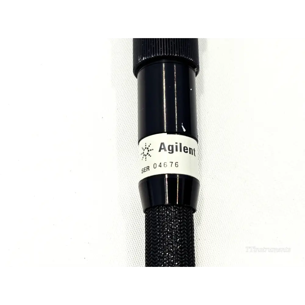 Agilent 85133-60016 cable body showing Agilent branding label and serial number 04676