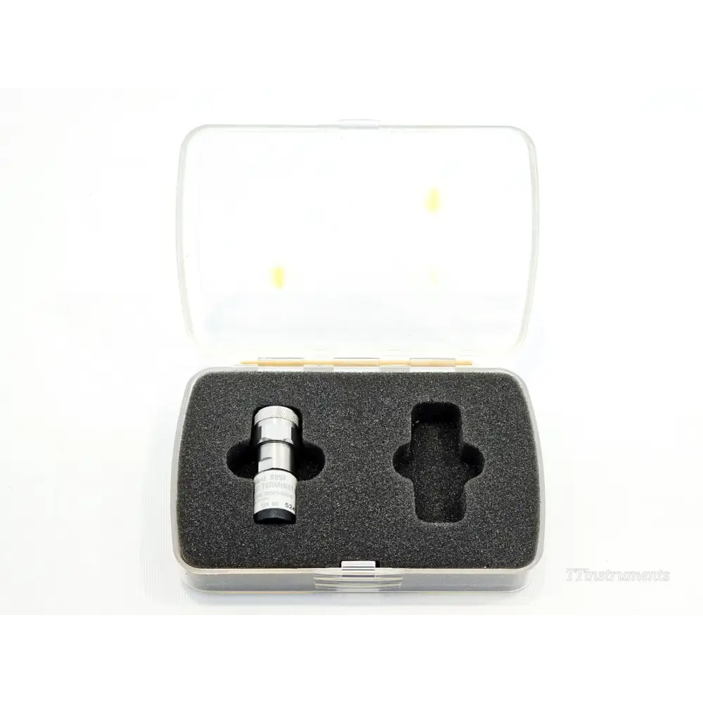 Keysight Agilent 909F OPT 012 label and model identification detail on coaxial termination body