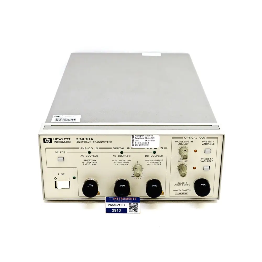 HP Agilent 83430A Lightwave Transmitter front panel with Keysight calibration sticker and TTInstruments product ID tag
