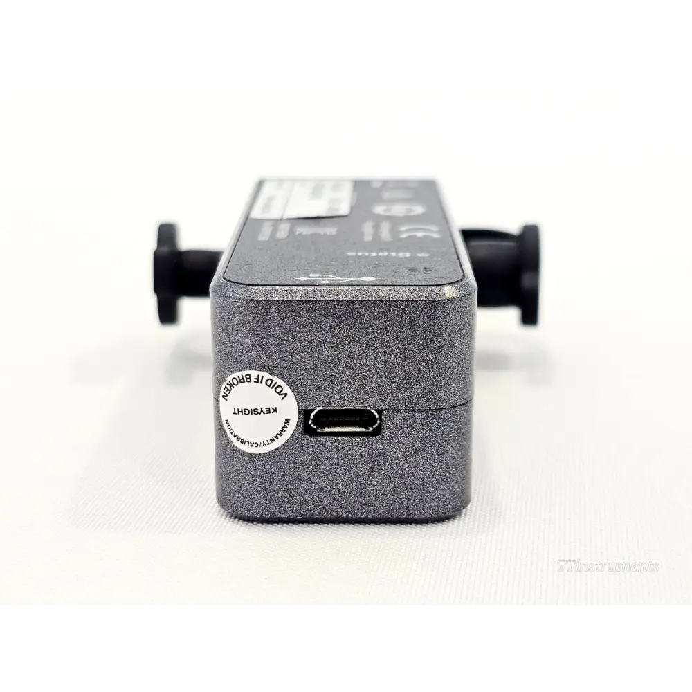 Keysight N7554A ECal module angled view showing both RF connector ports and housing