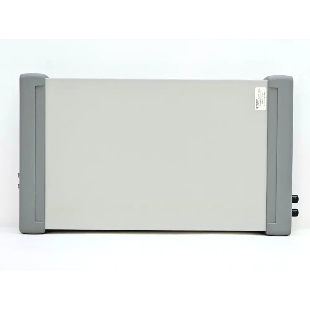 Keysight N7751A left-side panel showing white aluminium chassis, grey bumpers and partial view of rear trigger connectors