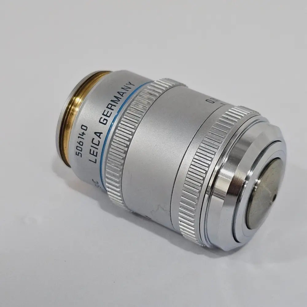 Leica DMRE HC microscope left side view with brightness control and stage adjustment
