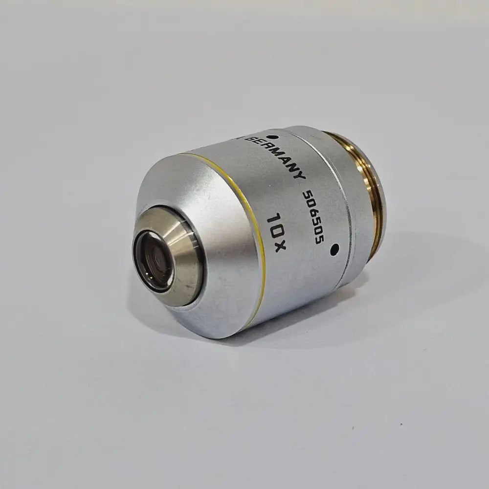 Leica DMRE HC microscope left side view with brightness control and stage adjustment