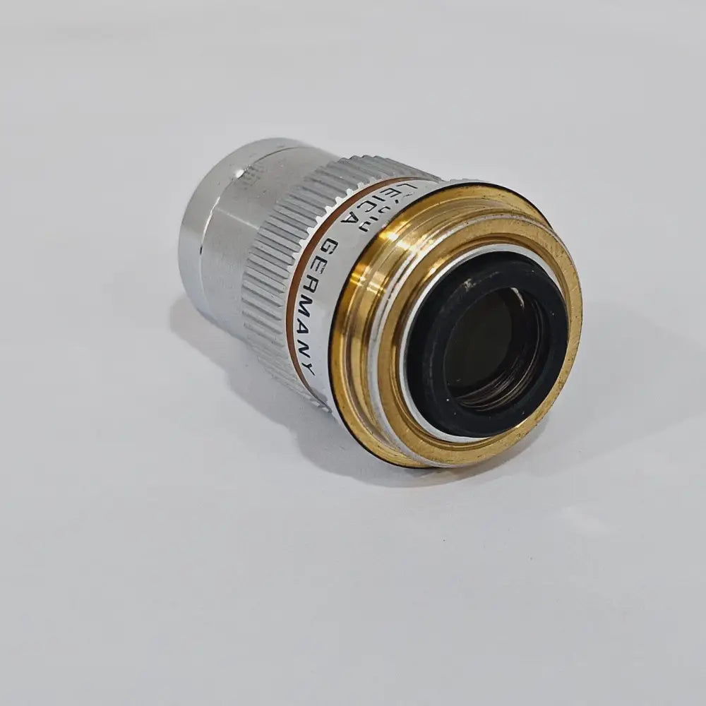 Leica DMRE HC microscope left side view with brightness control and stage adjustment