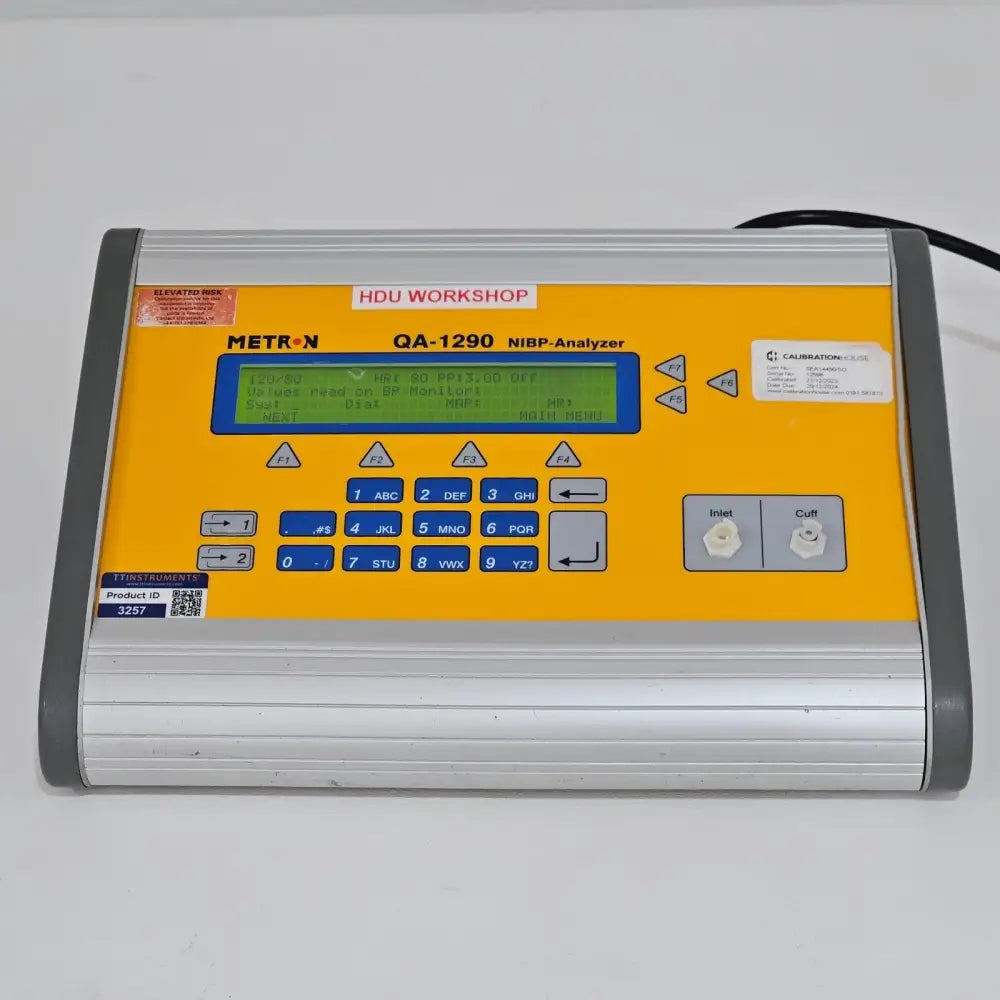 Metron QA-1290 NIBP Analyser front panel view showing display and function keys