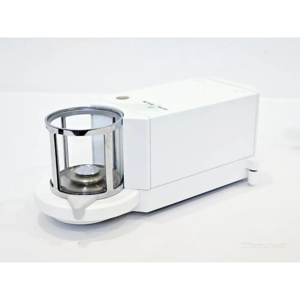 Mettler Toledo MX5 Microbalance side profile showing separate weighing cell and control unit configuration