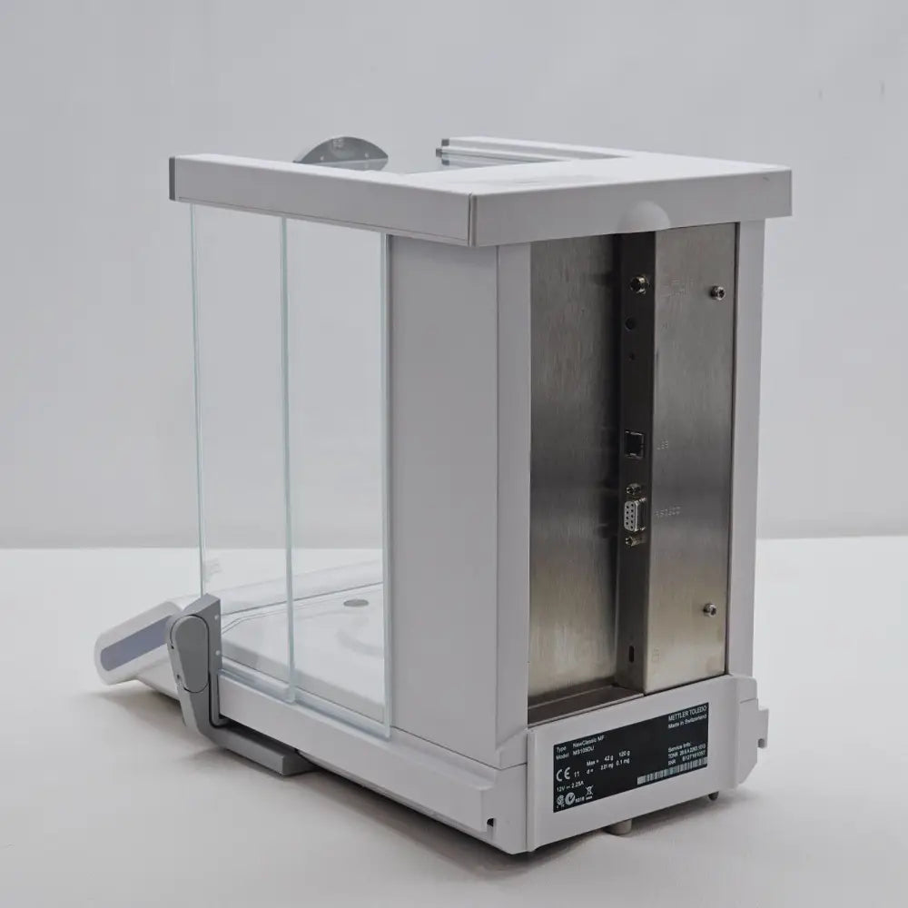 Mettler Toledo MS105DU balance rear three-quarter view showing metal housing and draft shield