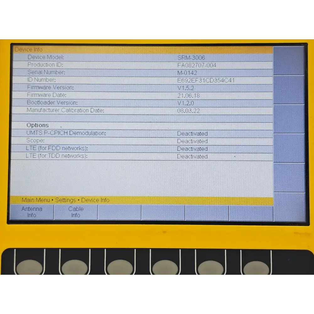 Narda SRM-3006 device info screen showing firmware V1.5.2, S/N M-0142, calibration 08.03.22, all options deactivated