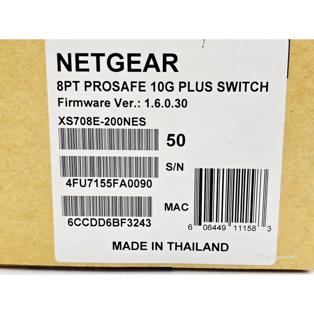 Netgear XS708E-200NES box label showing model, firmware v1.6.0.30, serial number and MAC address barcode