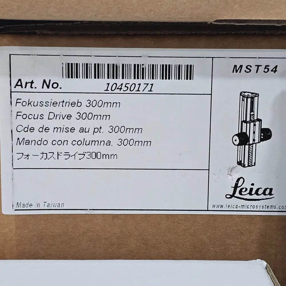Leica Ivesta 3 microscope individual parts laid out ready for assembly