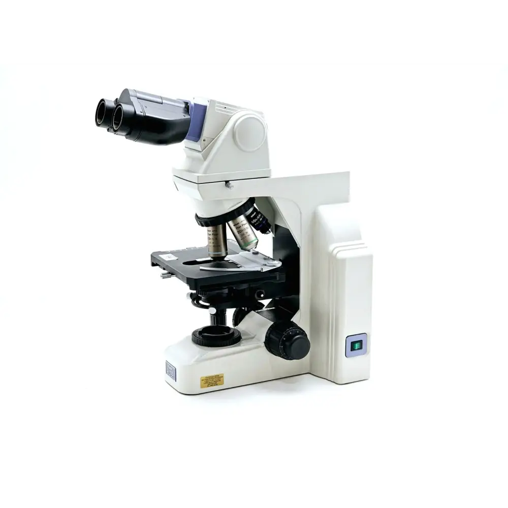Nikon Eclipse E400 microscope right side view showing focus knobs and stage controls