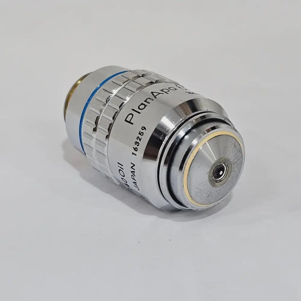 Nikon PlanAPO 60/1.40 Oil 160/0.17 finite objective angled view showing front lens element
