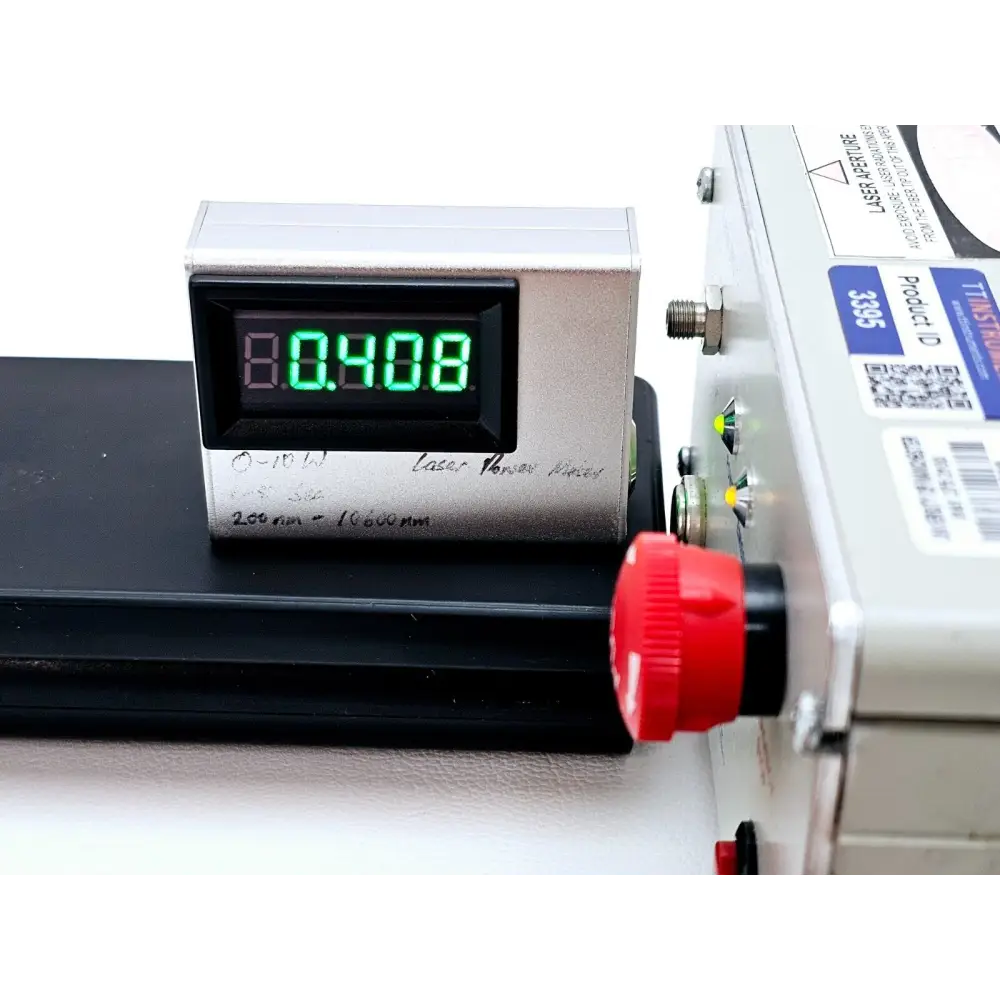 BRM-785 785nm laser module with fiber cable attached, bench-top spectroscopy setup view