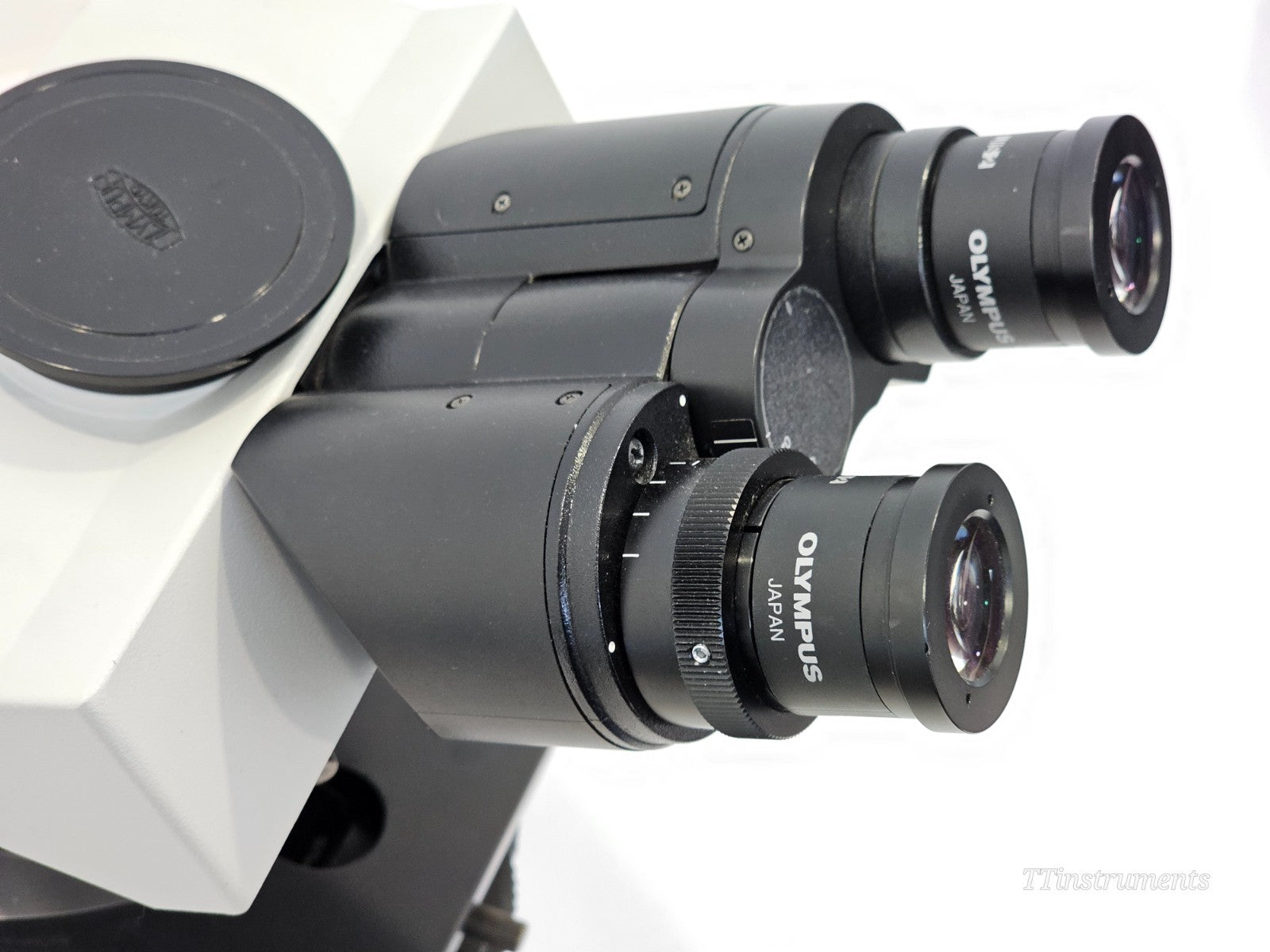 Olympus BX51TF upright microscope rear view showing fluorescence lamphouse connection port