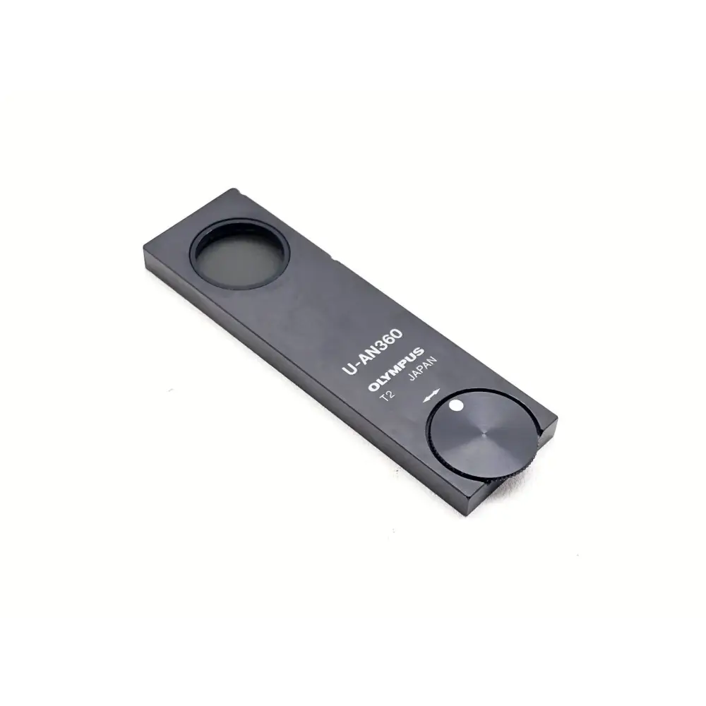 Olympus U-AN360 analyzer slider underside showing slide plate and mounting contact surfaces