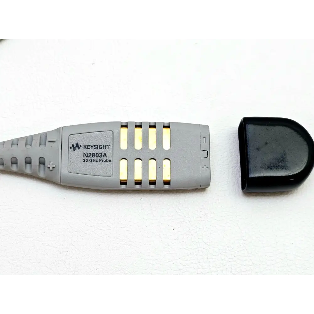 N2803A InfiniiMax III 30 GHz probe amplifier underside showing part number markings