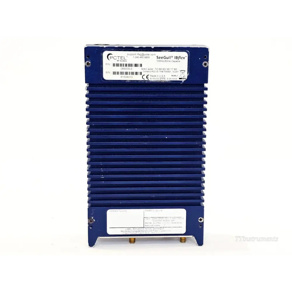 PCTEL SeeGull IBflex rear label showing P/N 08900S-E, S/N 81608013, MAC address, FCC ID, 8-16VDC 3.0A rating, and installed options