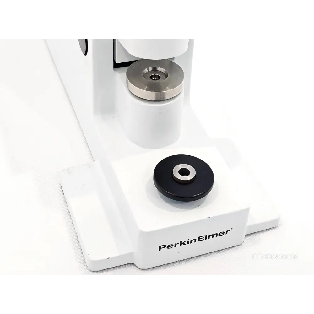 Assorted PerkinElmer DSC sample pans included with B0139005 crimper press