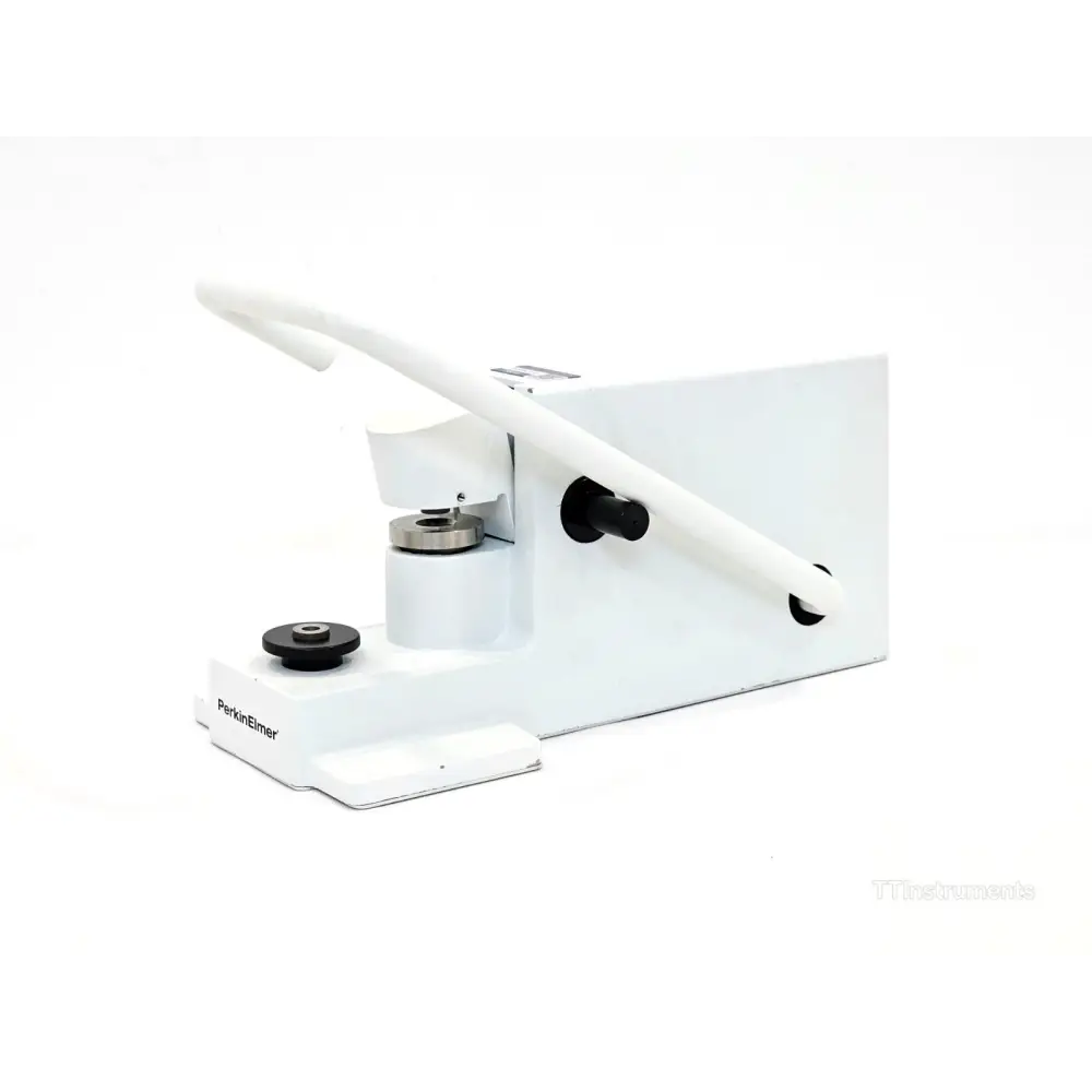 PerkinElmer DSC crimper press with die set and accessories laid out