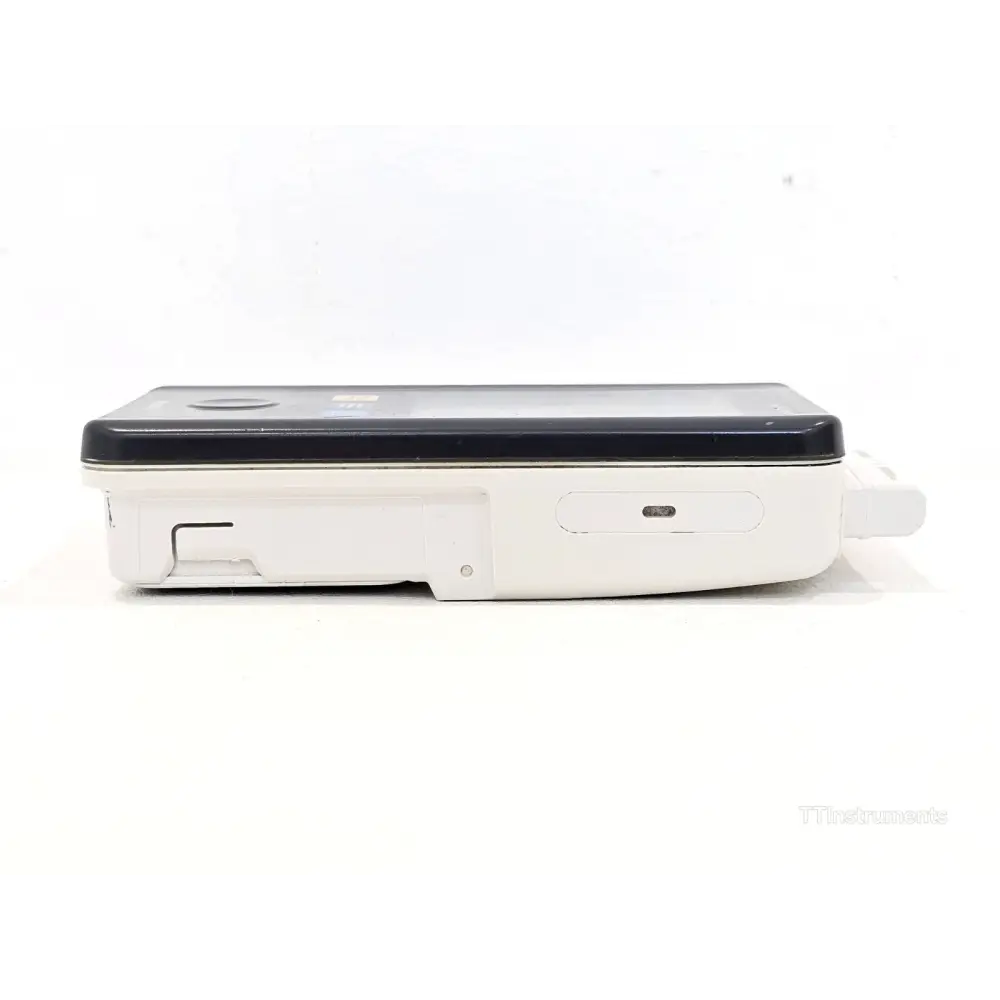 Philips IntelliVue MX40-2B4 wearable monitor right side view showing battery compartment slot and power indicator LED