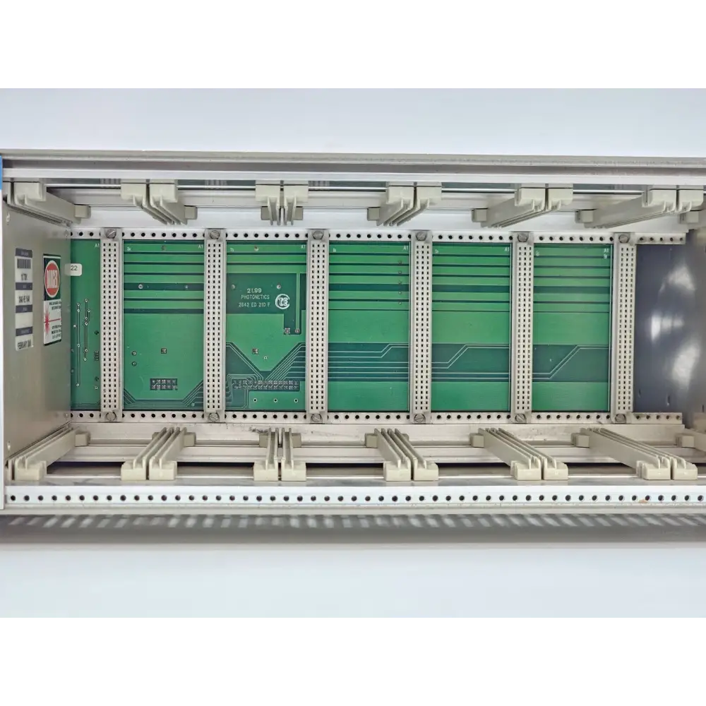 TUNICS-OM 3642 mainframe front panel showing display and control dials