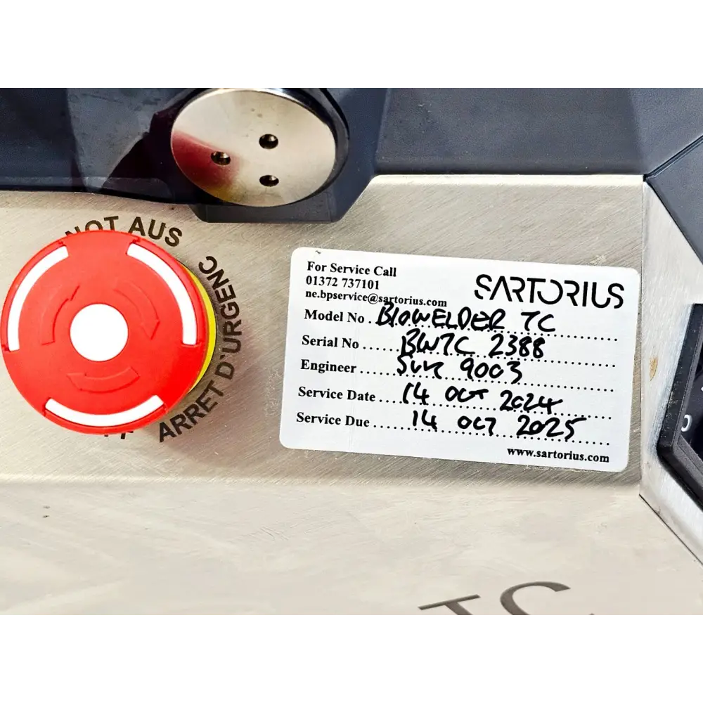 Sartorius BioWelder TC service label showing serial BWTC2388, service date 14 Oct 2024, service due 14 Oct 2025, red emergency stop button