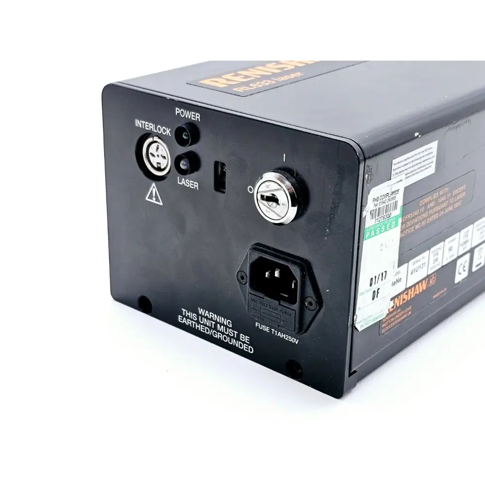 Renishaw RL633 HeNe laser — angled view of rear panel showing key-switch, interlock port, IEC inlet and PAT test sticker