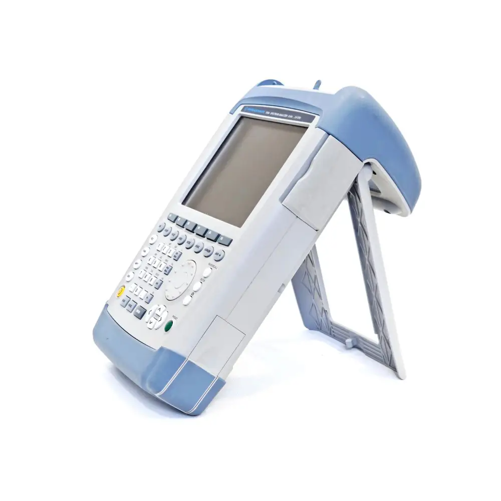 Rohde & Schwarz FSH4 handheld spectrum analyzer three-quarter left view with fold-out desk stand extended