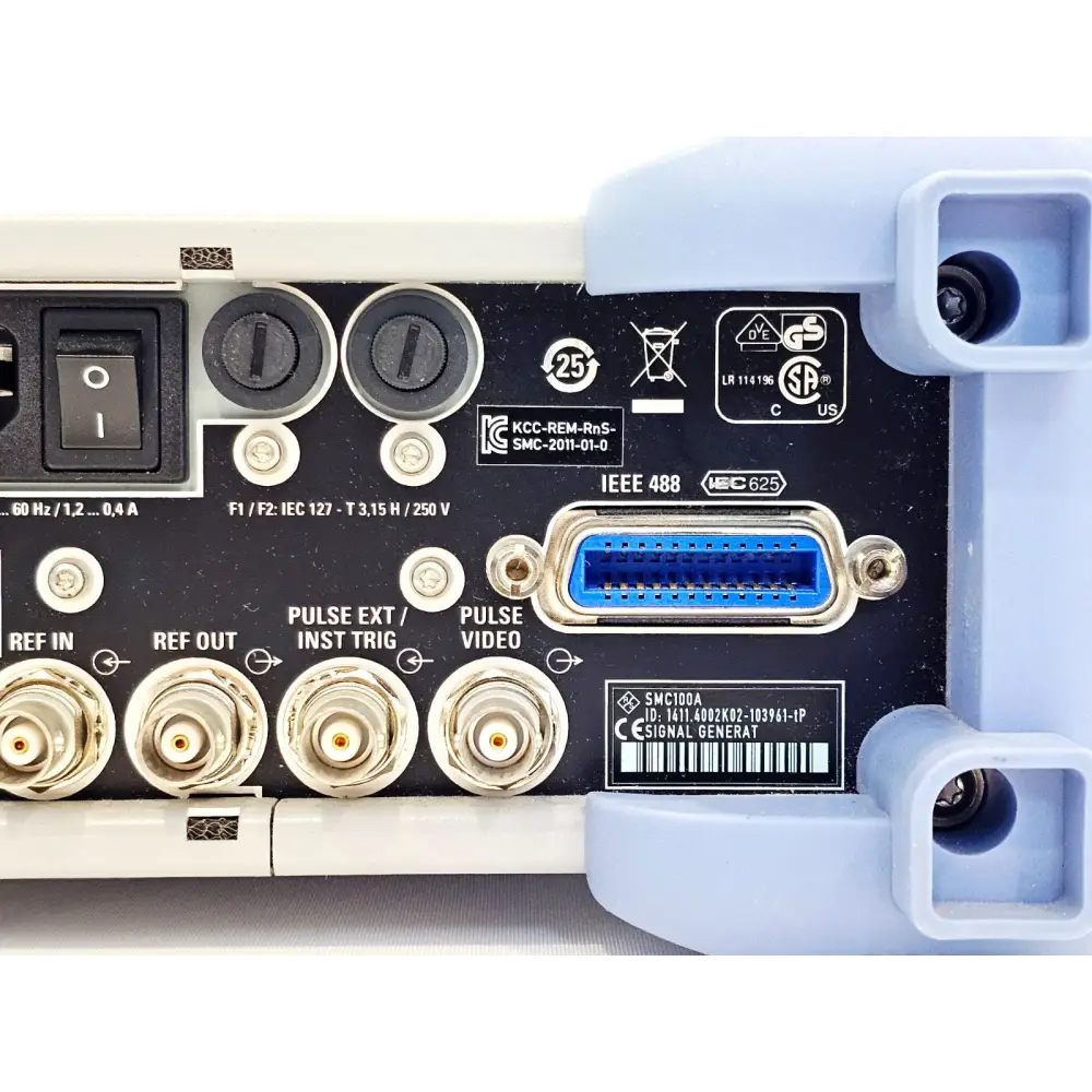 SMC100A rear panel close-up of IEEE 488 GPIB connector, serial number label ID 1411.4002K02-103961-1P and BNC connectors