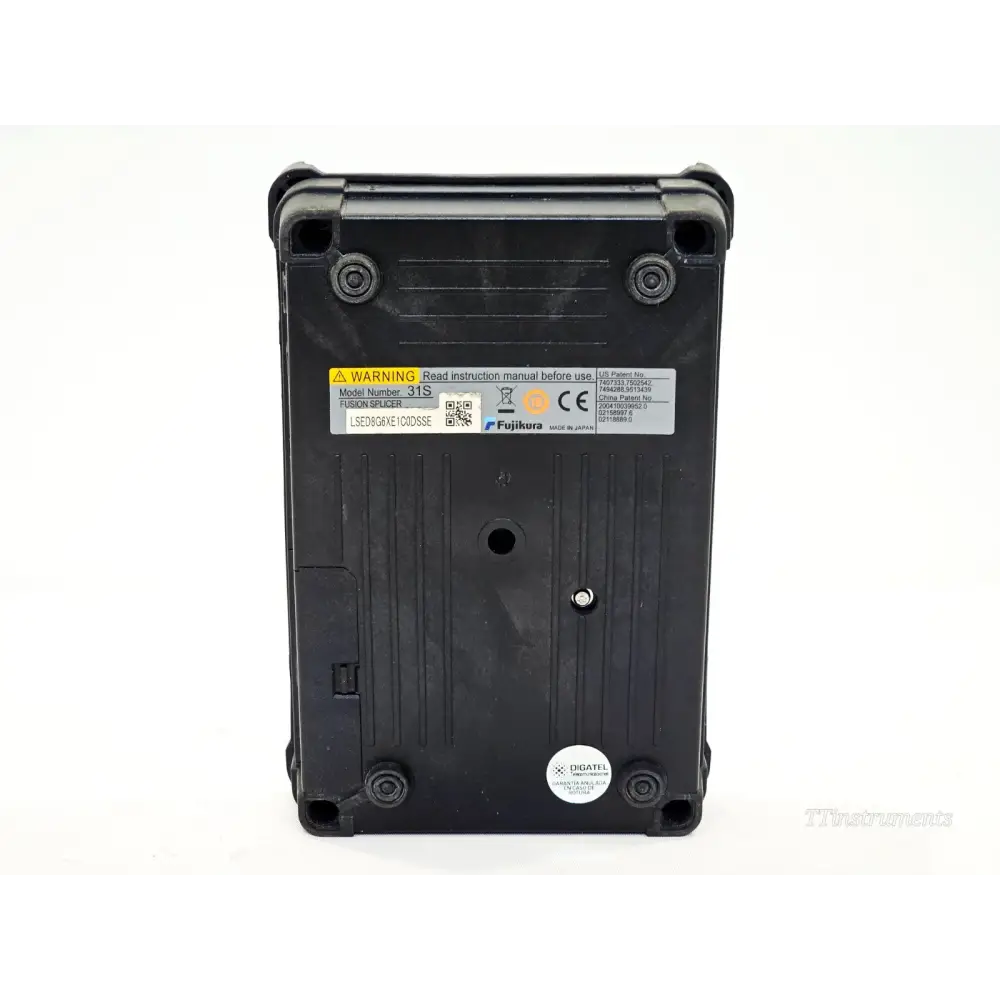 Fujikura 31S fusion splicer base label showing model number 31S, serial number LSED8G6XE1C0DSSE, CE mark