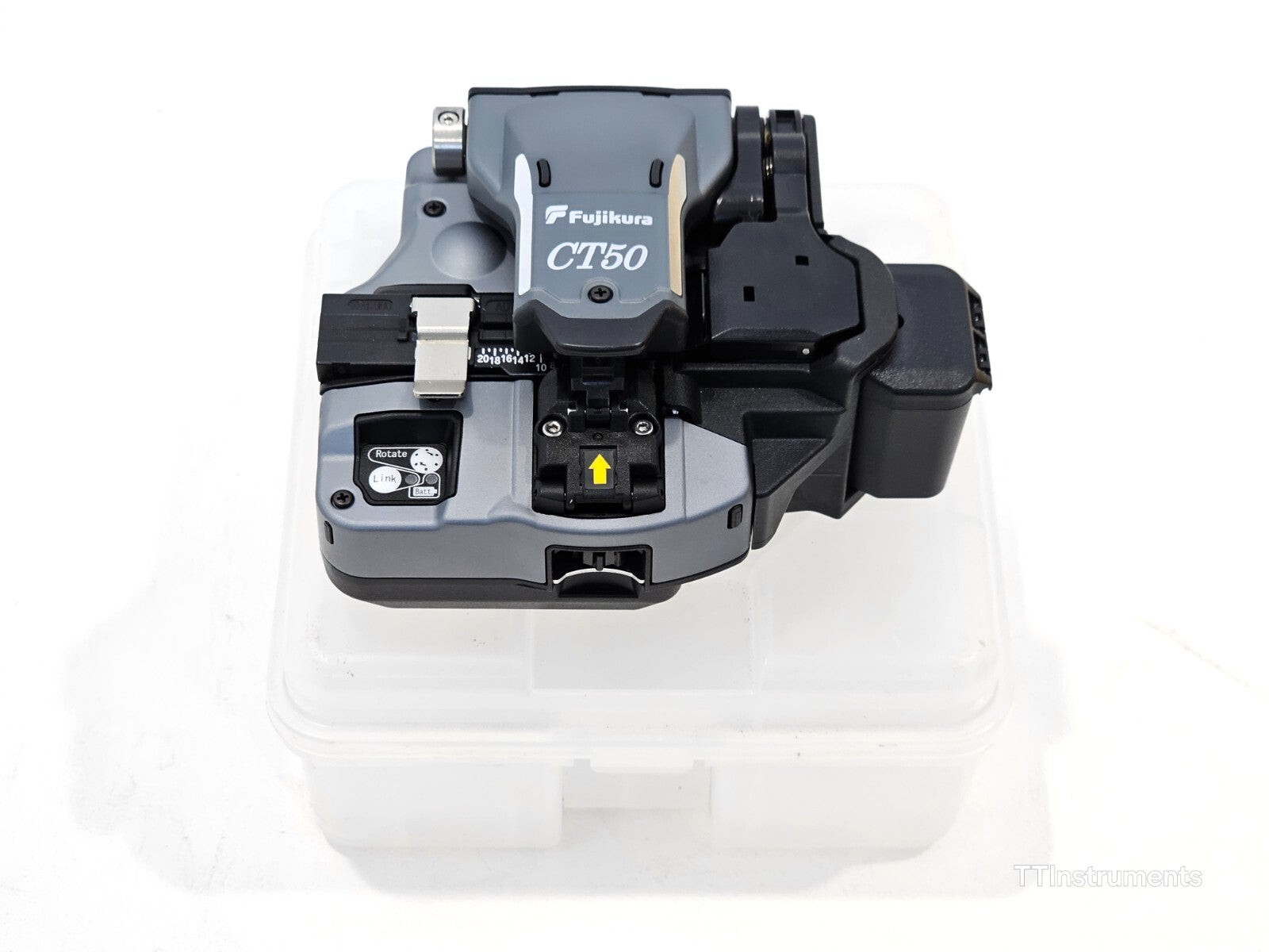 Fujikura 41S fusion splicer kit laid out showing AC adapter, battery pack, alcohol pot and work tray