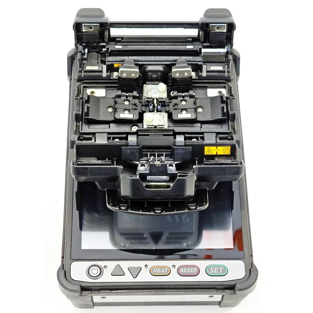 Fujikura 41S fusion splicer side view showing ports, AC adapter connection and battery pack