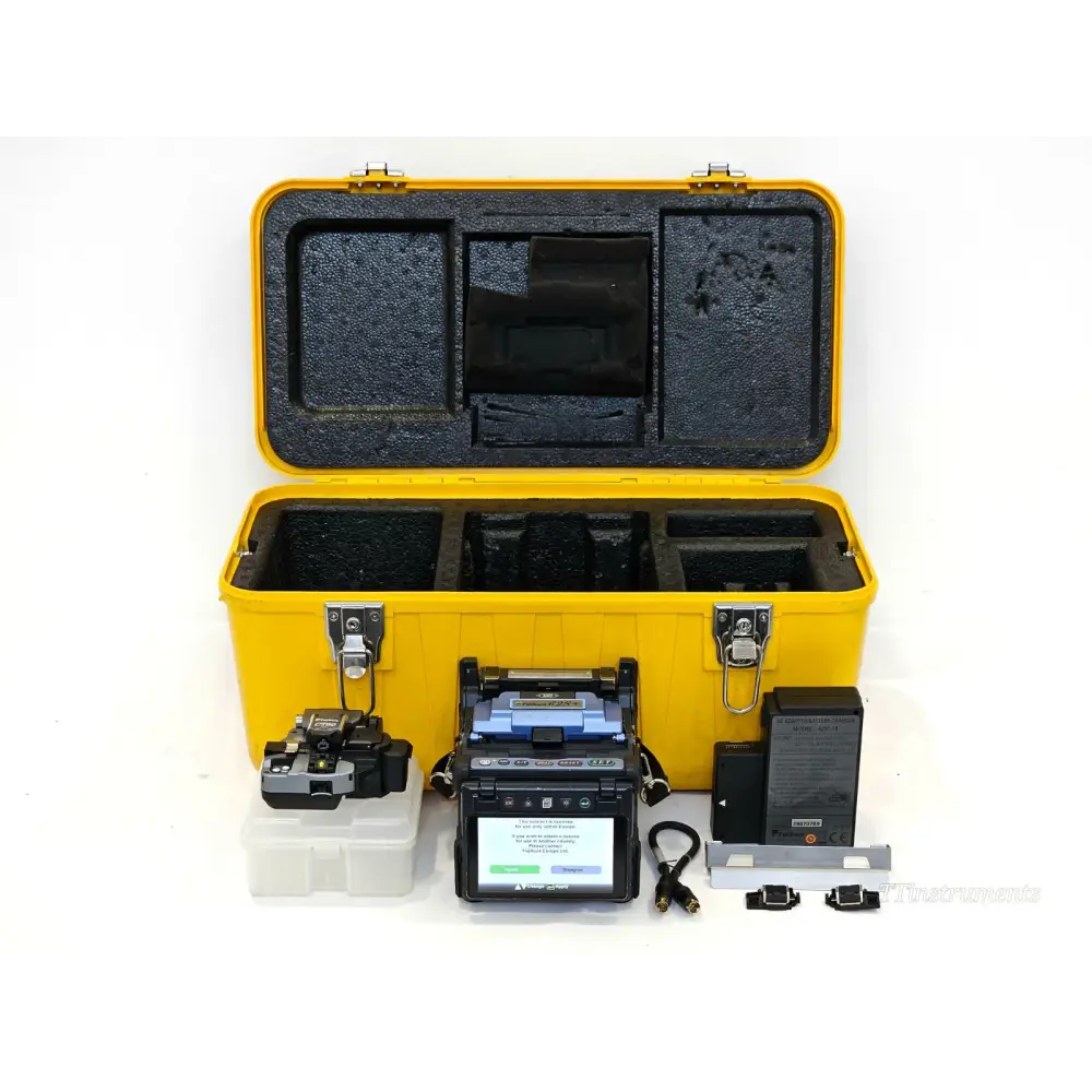 Fujikura 62S+ core alignment fusion splicer front view with lid open showing fibre V-grooves and electrodes