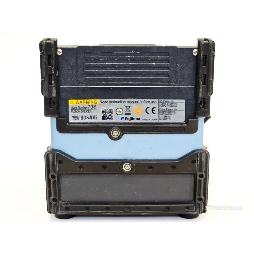 Fujikura FSM-70S fusion splicer rear base label showing model number 70S, serial number, and CE marking