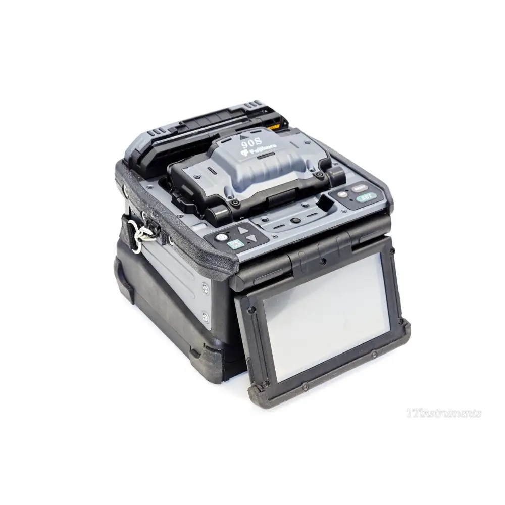 Fujikura 90S fusion splicer open lid showing fibre v-grooves and electrode assembly