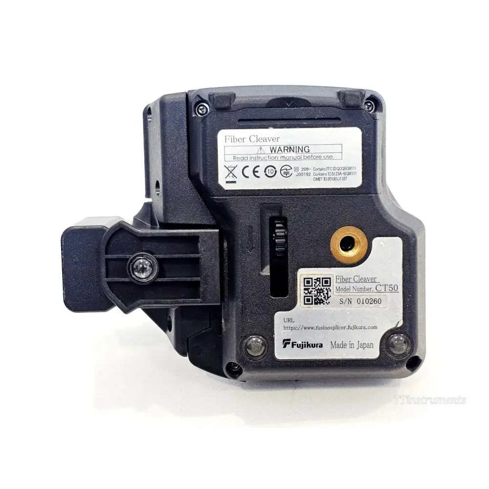 Fujikura 90S fusion splicer service label and unit detail showing refurbished condition