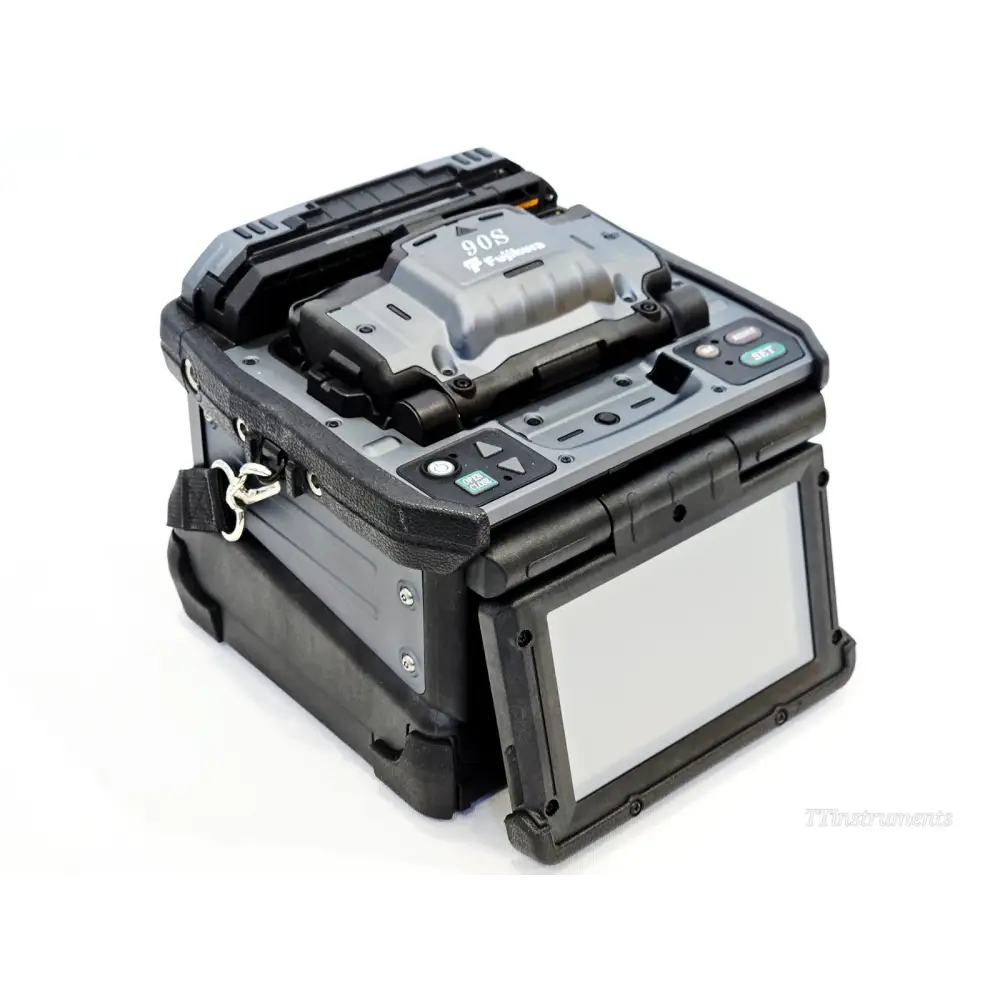 Fujikura 90S fusion splicer with lid open revealing splicing chamber and electrode assembly