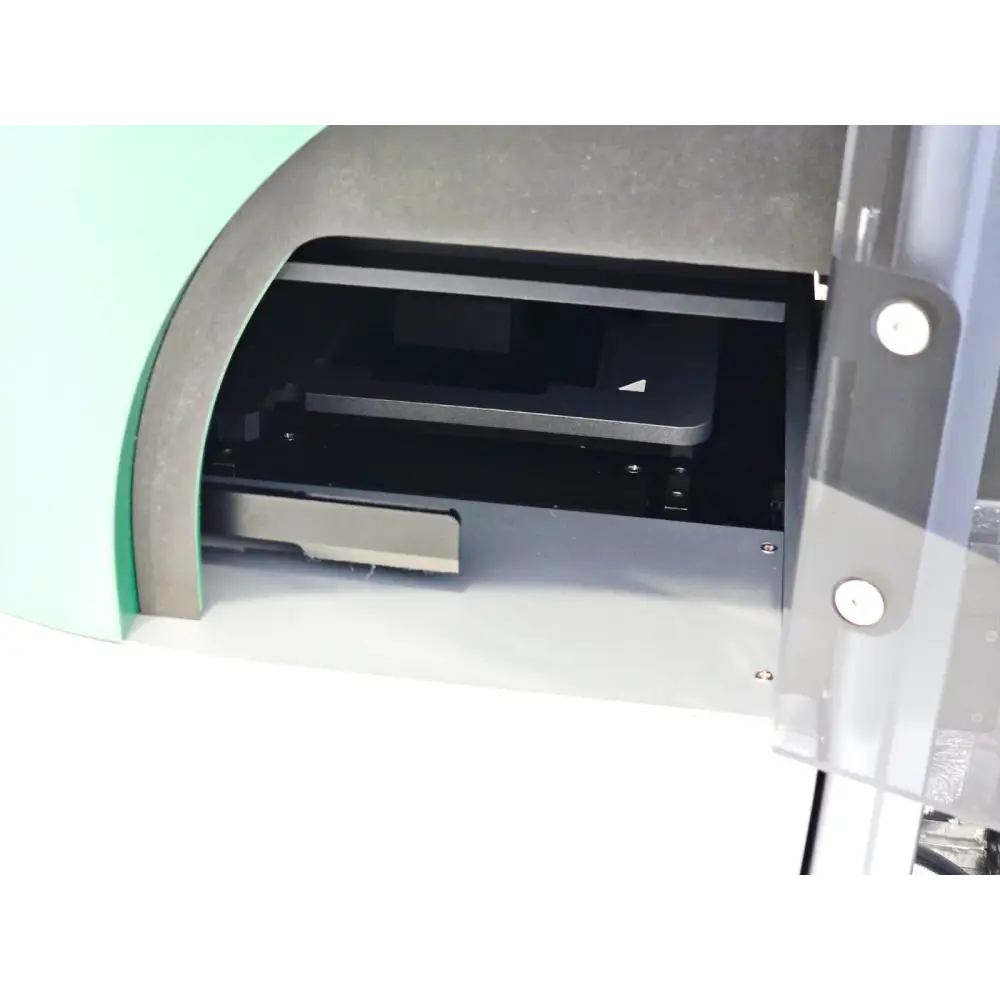 Solentim Cell Metric CLD imaging chamber open showing motorised plate stage and internal optical components