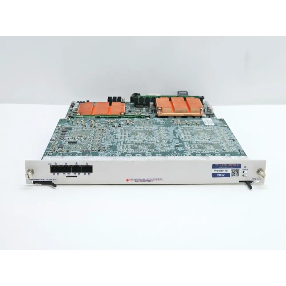 Spirent MX2-10G-S4 4-port 10G/1GbE SFP+ test module — front and PCB view showing dual copper heatsinks