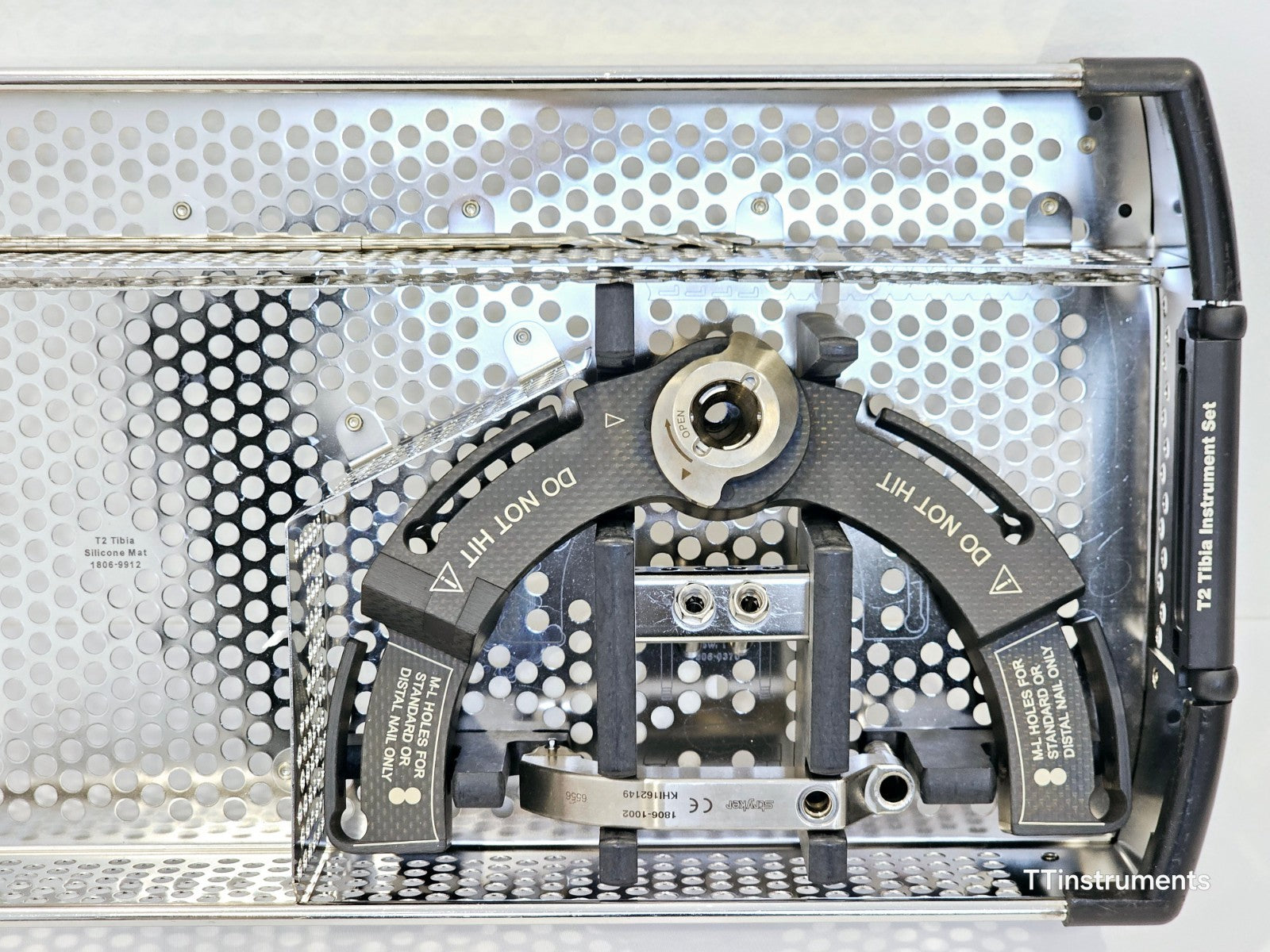Stryker T2 Tibia targeting arm 1806-1001 and nail adapter 1806-1002 close-up in sterilisation tray