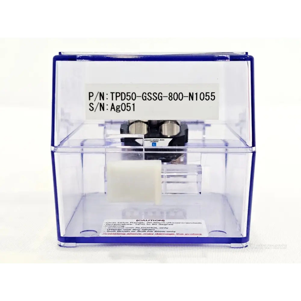 T Plus TPD50-GSSG-800-N1055 probe head in case, rear label showing P/N TPD50-GSSG-800-N1055 and S/N Ag051 with caution notice