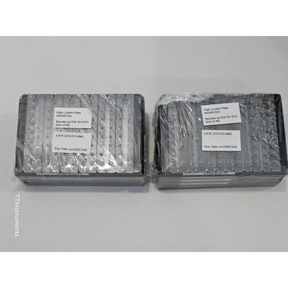 Unchained Labs Lunatic spectrophotometer with laptop and accessories arranged together