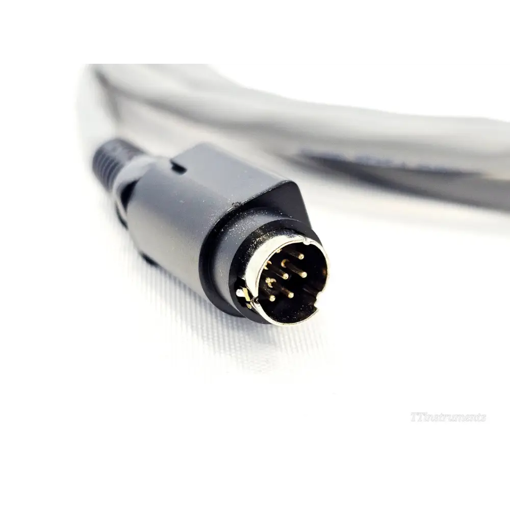 VIAVI E980TUXOSX close-up of 8-pin mini-DIN male connector end with black overmould