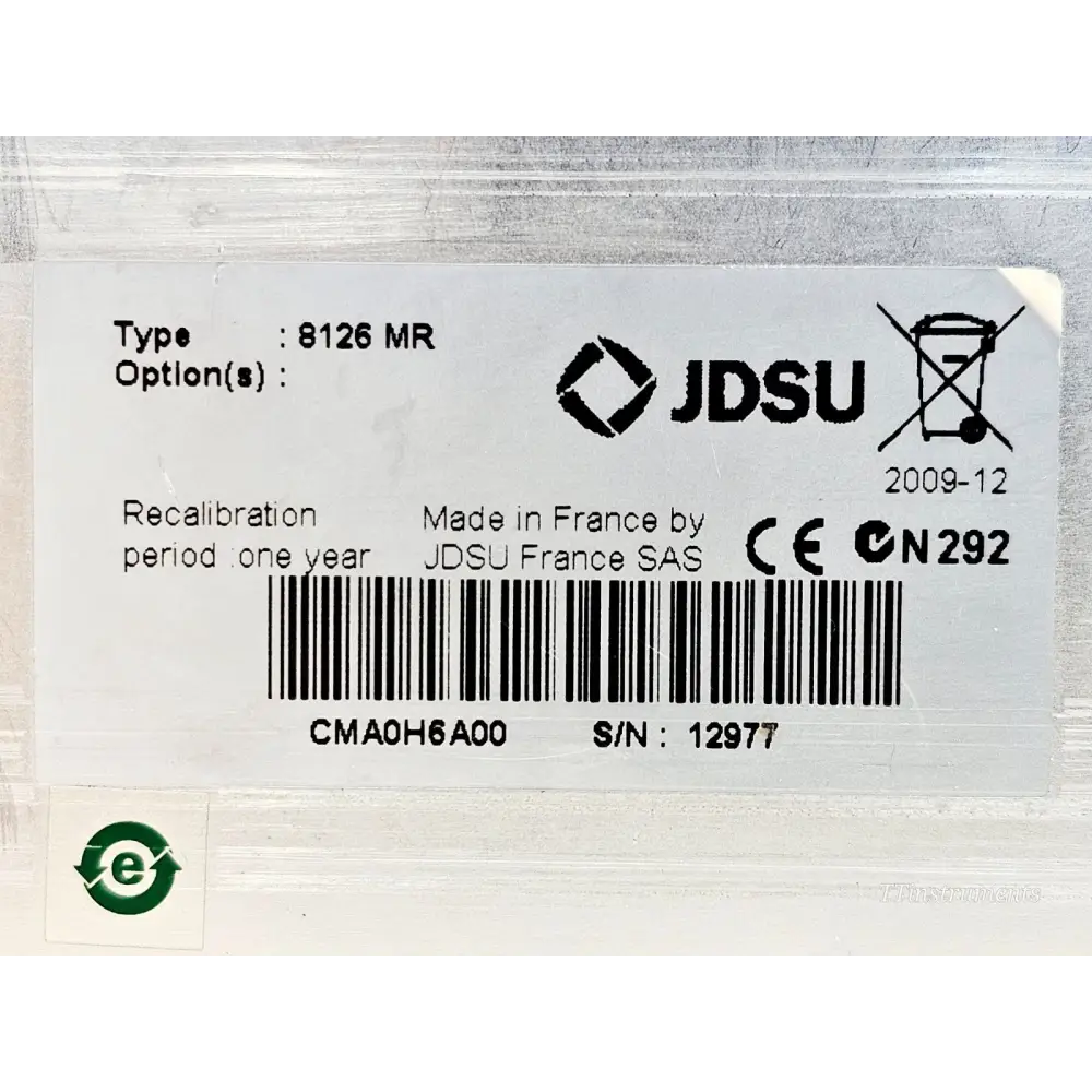 Close-up of JDSU 8126 MR label showing type, serial number 12977, CE marking and recalibration period