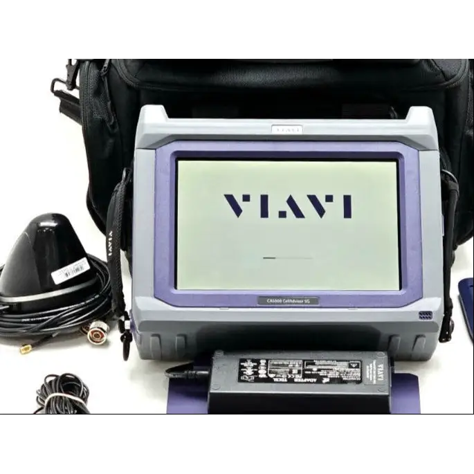 VIAVI CA5000 CellAdvisor 5G booting up showing VIAVI logo, with GPS antenna, AC adapter and carry case