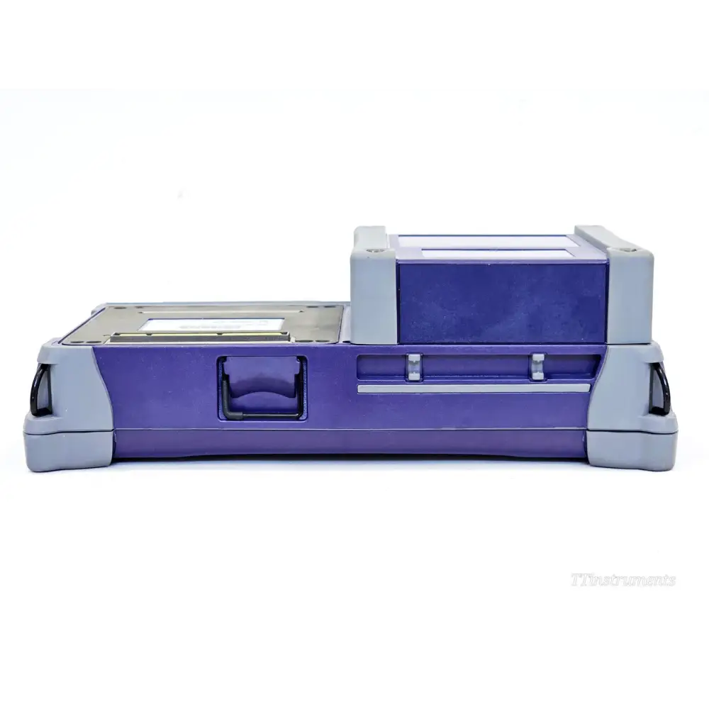 JDSU MTS T-BERD 4000 bottom view showing battery compartment latch, module bay slots, and compact rugged housing profile