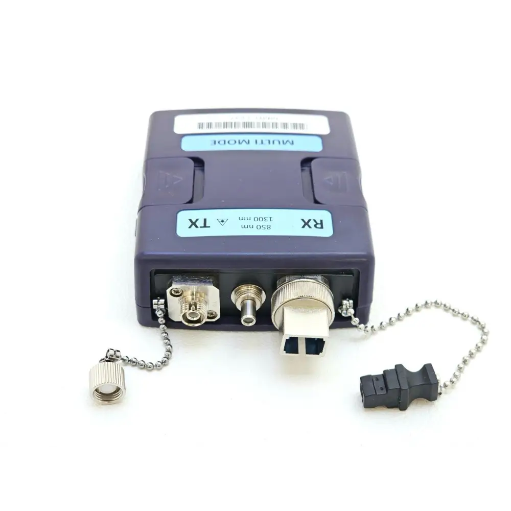 Viavi NGC_AD_EF_MM1 multimode fiber adapter angled view with FC TX port, SC and ST adapters and dust caps on chain
